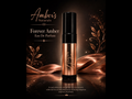 A perfume roller bottle labeled 'Forever Amber' by Amber's Naturals, shown against a dark brown background with metallic rose-gold draped fabric and decorative gold leaf graphics.