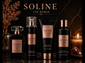 Soline perfume and skincare products on a dark background with decorative elements.